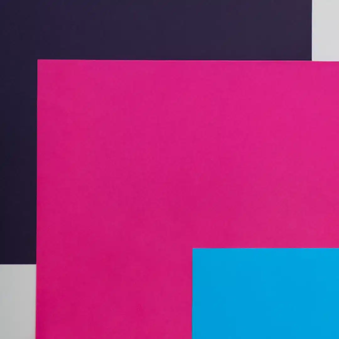 Colorful paper sheets, cut into geometric shapes